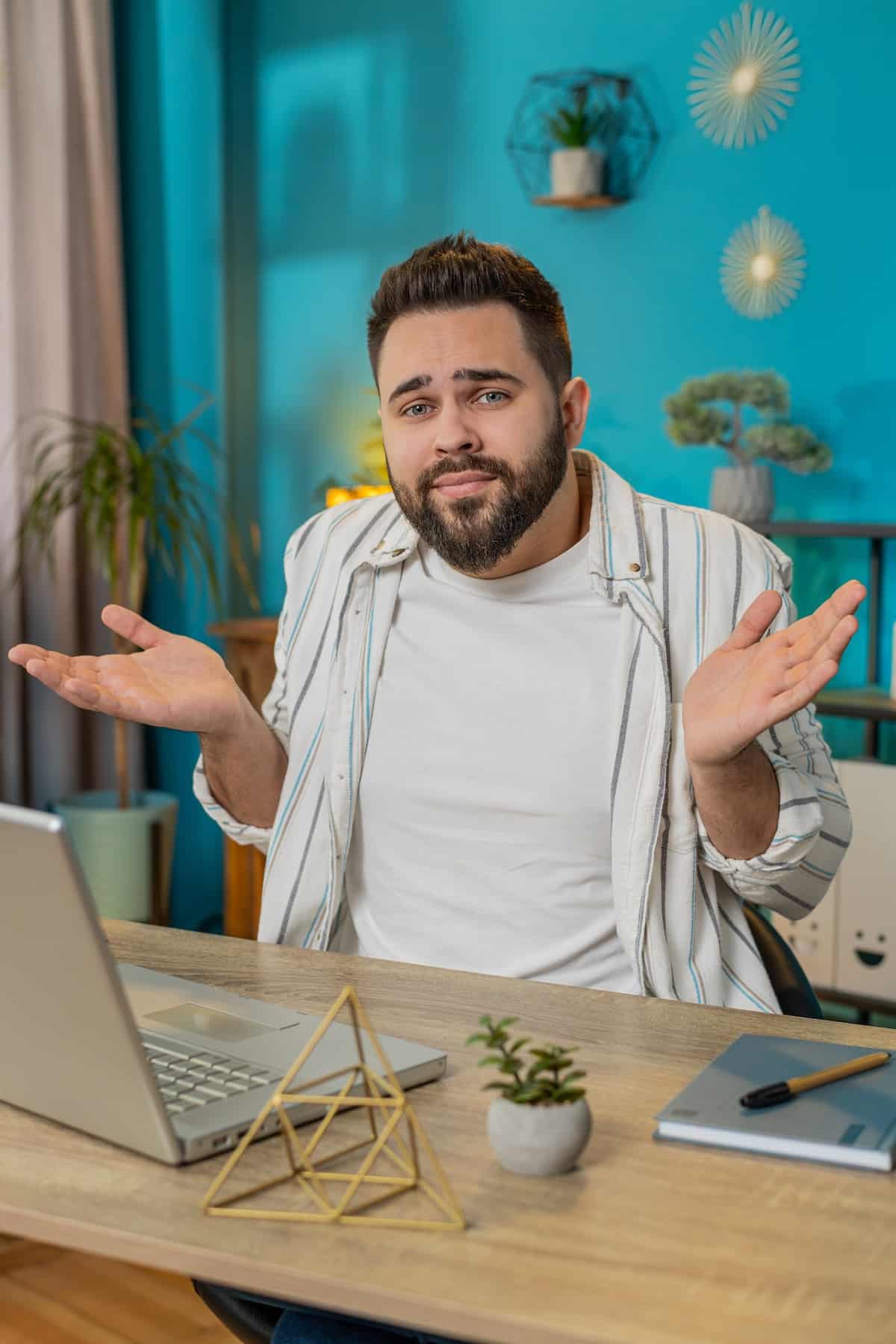 Confused man feeling embarrassed Confused man feeling embarrassed about ambiguous questions